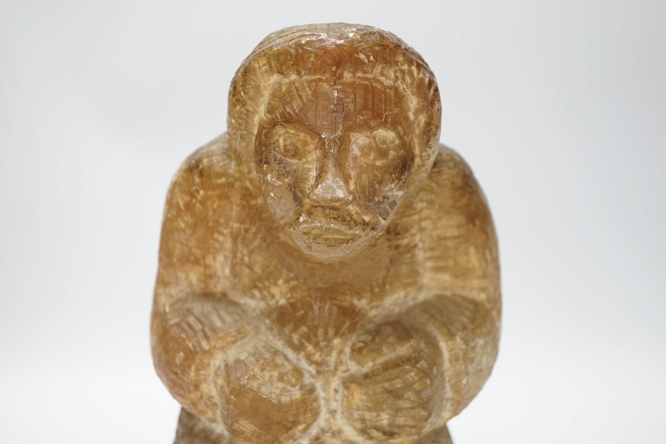 A soapstone Inuit carved figure, 22cm high
